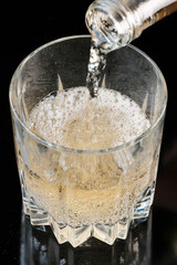 Sweet lemonade drink is poured