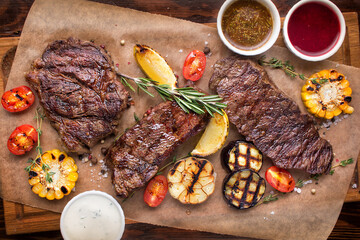 Grilled tender meat with vegetables. Restaurant serving concept. Isolated.