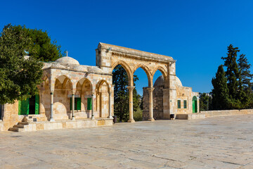 Fototapeta na wymiar Temple Mount with gateway arches leading to Dome of the Rock Islamic monument shrine in Jerusalem Old City, Israel