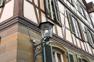 An old street lamp on a half-timbered house in the old town of Schwäbisch Hall, Germany.