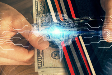 Multi exposure of brain drawing hologram and us dollars bills and man hands. Ai invest concept