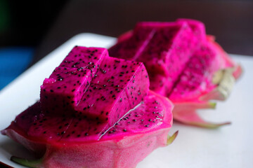 the dish of dragon fruit or pitaya on a white plate