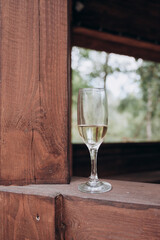 half-finished glass of champagne on the table