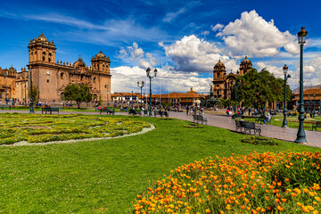 Peru. Cusco, historic city of the Inca Empire. Cusco's main square (Plaza de Armas). The Cathedral Basilica (on the left side) and the Church of the Society of Jesus in the background - obrazy, fototapety, plakaty
