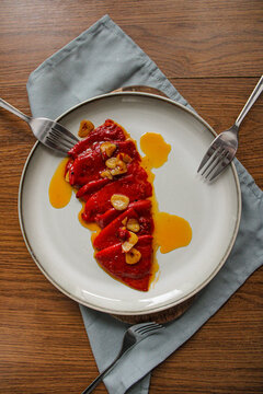 Spanish Piquillo peppers with garlic and olive oil. Spanish tapas dish. 