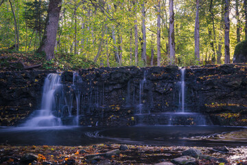 waterfall in autumn forest