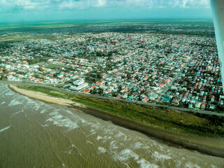 Aerial photo of Georgetown Guyana. Sea wall side. View to Sea Breeze hotel.