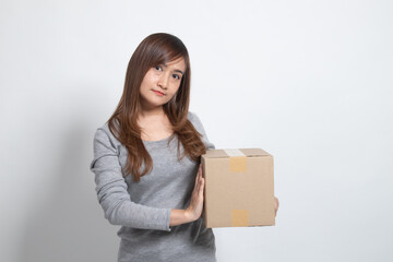 Delivery, relocation and unpacking.  young asian woman holding cardboard box.