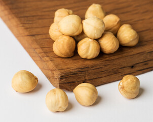 HAZELNUT. Hazelnuts on wooden background.
