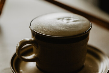 Cup of coffee on table