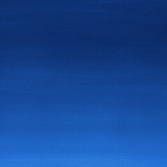 Blue ink and watercolor texture on white paper background. Gradient paint strokes and decalcomania effect. Hand-painted gouache abstract image. Mess on the canvas.