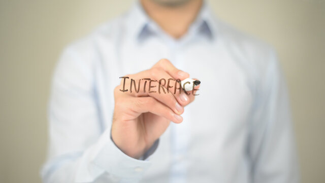 Interface , Man writing on transparent screen