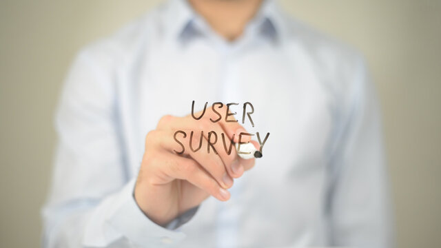 User Survey, Man Writing on Transparent Screen