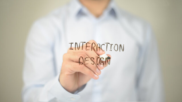 Interaction Design , Man writing on transparent screen