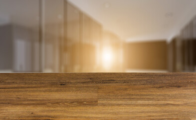 view of the workplace of the manager. large office.. Sunset. 3D rendering. Abstract blur phototography. wooden table on blurred background.