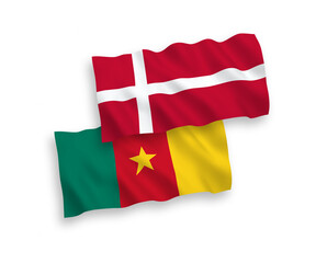 National vector fabric wave flags of Denmark and Cameroon isolated on white background. 1 to 2 proportion.