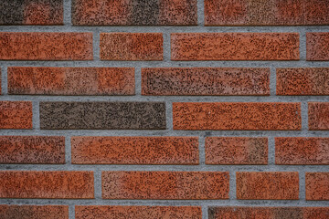 Brick texture, clinker bricks, New and clean with rich colors red orange brown brick wall