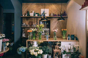 Small business. Flower shop interior. Floral design studio, decorations and arrangements and gifts....