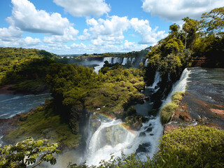 Naklejka na ściany i meble beautiful scenic iguazu waterfall with a rainbow