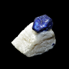 lapis lazuli in rock on black background 