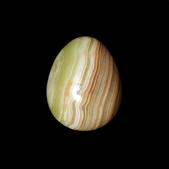 onyx egg on black background 