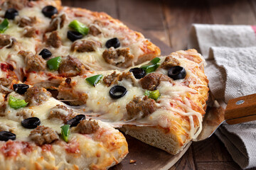 Sausage Pizza With Black Olives and Peppers