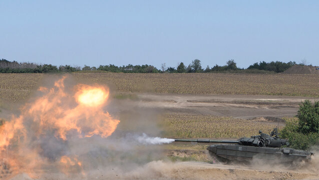 The tank fires a cannon and jumps from a springboard at the training ground