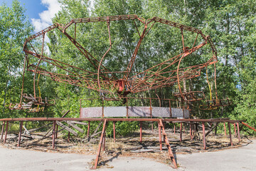 Abandoned broken rusty carousel in Pripyat Ukraine