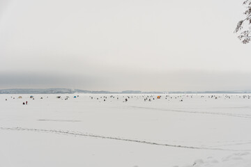 Winter fishing championship in Belarus, thousands of fishermen on ice in winter