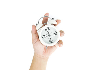 caucasian man hand adjusting the time of a Retro clock an vintage style, isolated on white background