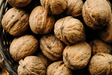 Walnut on a wooden board.