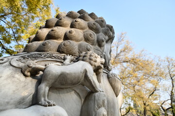Stone statue of chinese lion near Baihai park, Beijing, China
