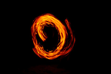 Circle of Fire flame with movment isolated on black isolated background - Beautiful yellow, orange and red and red blaze fire flame texture style.