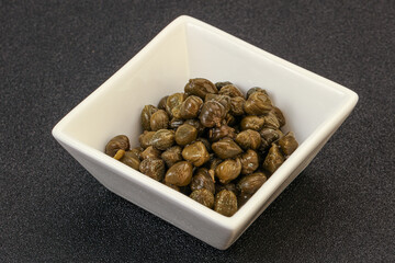 Tasty capers in the bowl