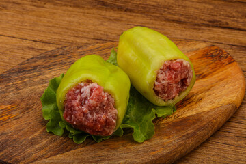 Raw stuffed pepper for cooking