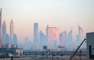Dubai, UAE - 01.15.2021 Cityscape rising from the fog. Outdoors