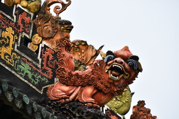 Colorful wooden carved lion in Guangzhou, China