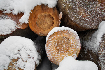 The mountain road is snowy and icy. Images of cut wood on the roadside. Spectacular winter scenery. Uludag National Park. Bursa, Turkey. 