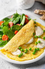 Bio eggs omelet with salad