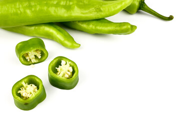 fresh green banana peppers or sweet peppers (capsicum annuum) isolated on a white background