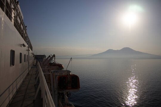 spectacular image of the maritime coast seen from a ferry at dawn with the promontory in the background