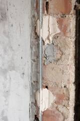 setting the level for plastering walls.  beacons on plaster mortar.