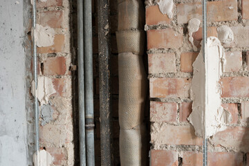 setting the level for plastering walls. installation of beacons.