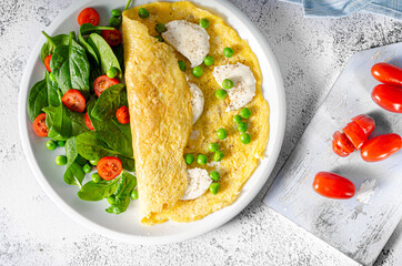 Bio eggs omelet with salad
