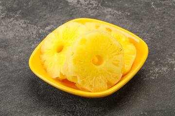 Sweet pineapple rings in the bowl