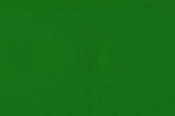 Clean green retro paper background. Vintage cardboard texture. Grunge paper for drawing. Simple blank fabric pattern.