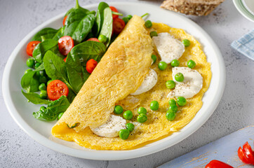 Bio eggs omelet with salad