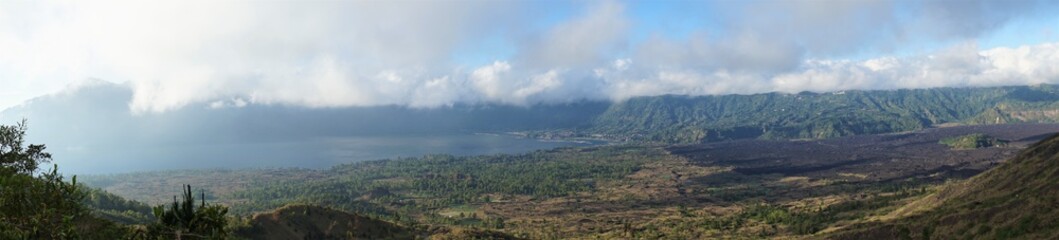 Fototapeta na wymiar Panoramic view of a lake surrounded by mountain, Danau Batur, Gunung Batur, Kintamani, in Bali island, Indonesia. 