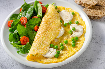 Bio eggs omelet with salad