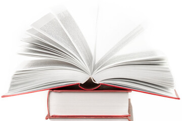 Open pages book on stack of books isolated on white background